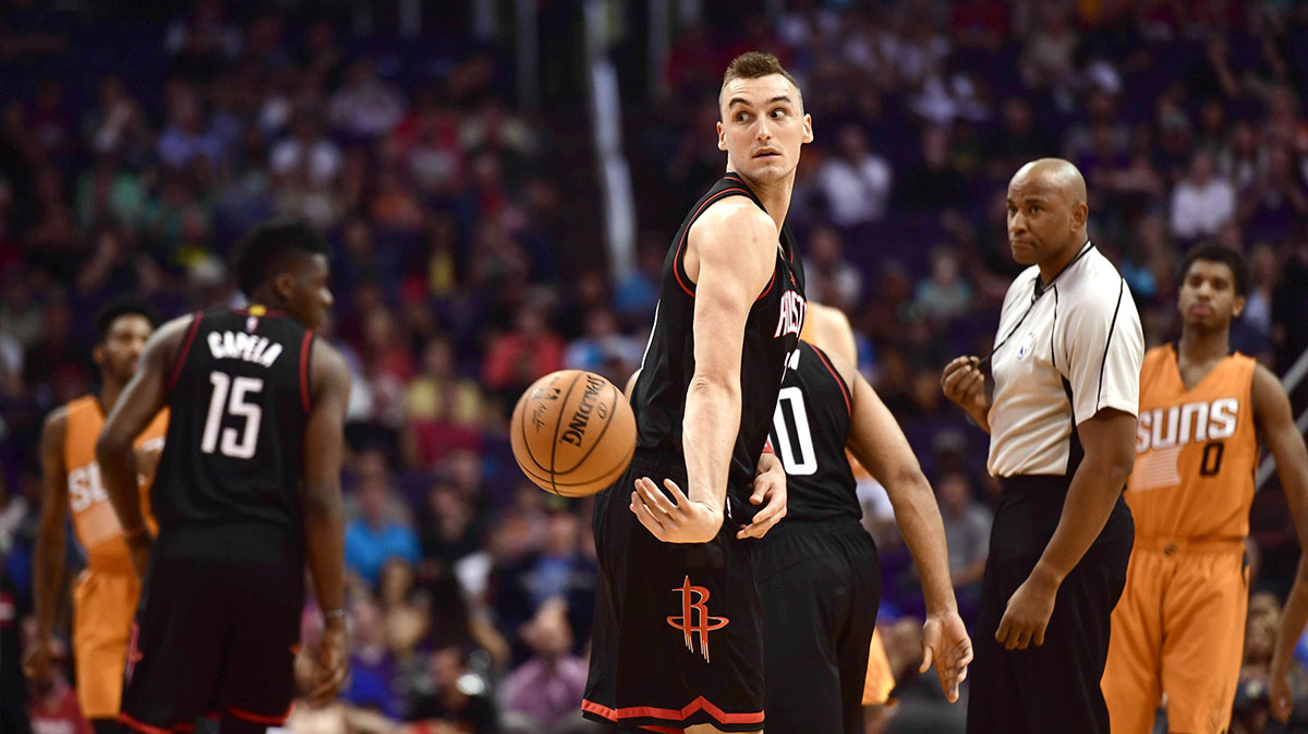 Houston Rockets forward Sam Dekker (7) passes the ball against the Phoenix Suns during the first half at Talking Stick Resort Arena.