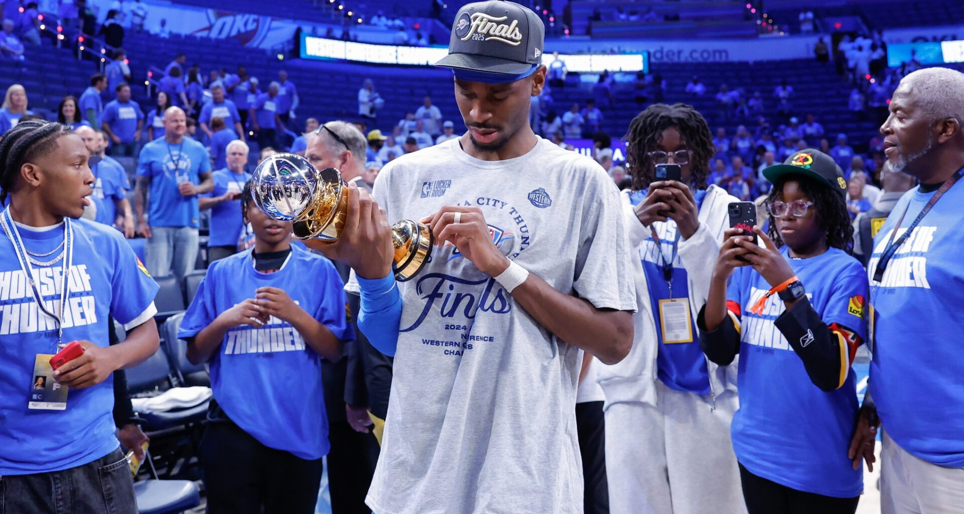 Oklahoma City Thunder guard Shai Gilgeous-Alexander (2) looks at his western conference finals MVP trophy after his team defeated the Minnesota Timberwolves in the western conference finals at Paycom Center.