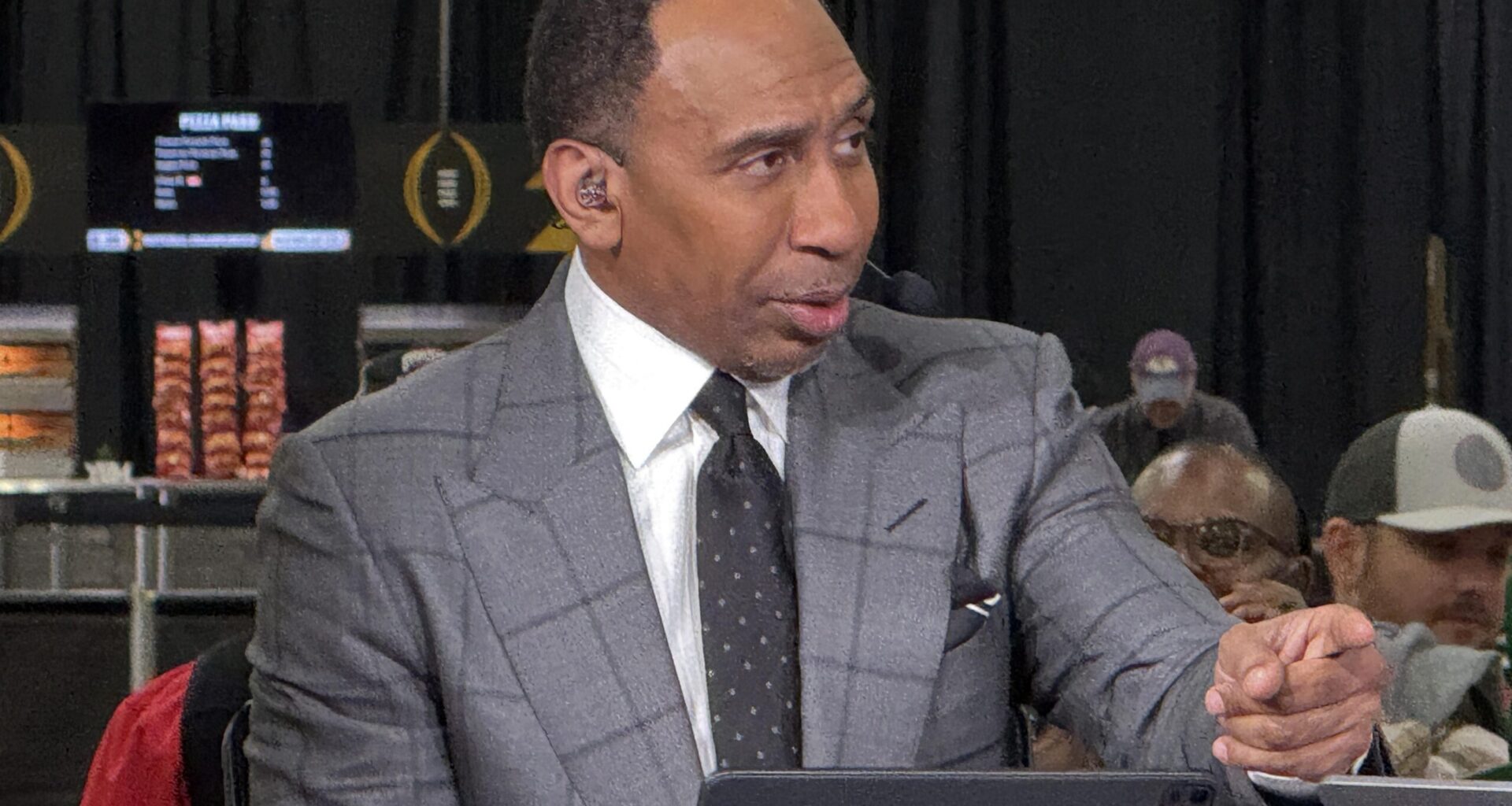 ESPN personality Stephen A. Smith on the ESPN First Take set at the CFP Fan Central at the George World Congress Center.