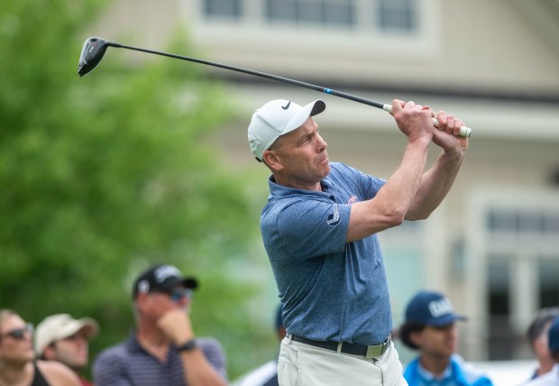 UConn's Head Hockey coach Mike Cavanaugh watches his drives at the 1st tee on Wednesday, June 18, 2025, during the 2025 Travelers Championship Pro-Am at TPC River Highlands in Cromwell. (Aaron Flaum/Hartford Courant)