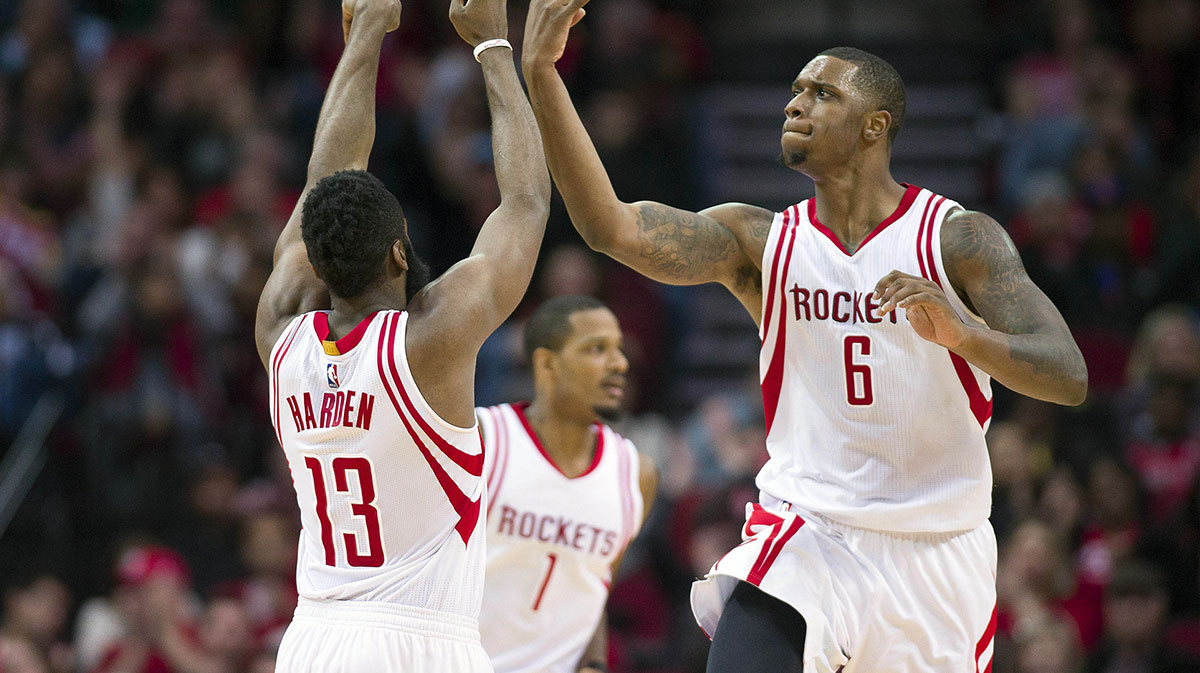 Houston Rockets guard James Harden (13) and forward Trevor Ariza (1) and forward Terrence Jones (6) celebrate during the second half against the Milwaukee Bucks at the Toyota Center. The Rockets defeat the Bucks 102-98. 
