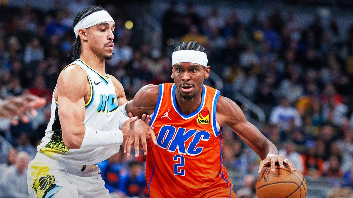 Thunder guard Shai Gilgeous-Alexander (2) dribbles the ball while Indiana Pacers guard Andrew Nembhard (2) defends in the second half at Gainbridge Fieldhouse