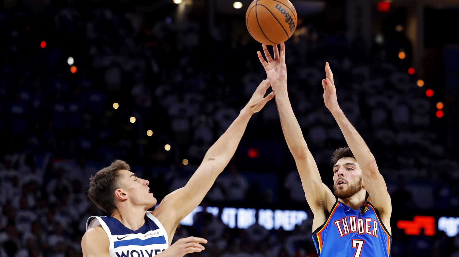 Thunder forward Chet Holmgren (7) shoots the ball against Minnesota Timberwolves center Luka Garza (55) during the fourth quarter in game five of the western conference finals for the 2025 NBA Playoffs at Paycom Center