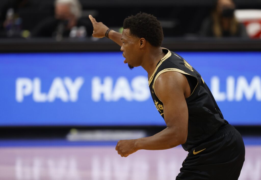 Toronto Raptors guard Kyle Lowry (7) makes a three point basket against the Utah Jazz during the first quarter at Amalie Arena