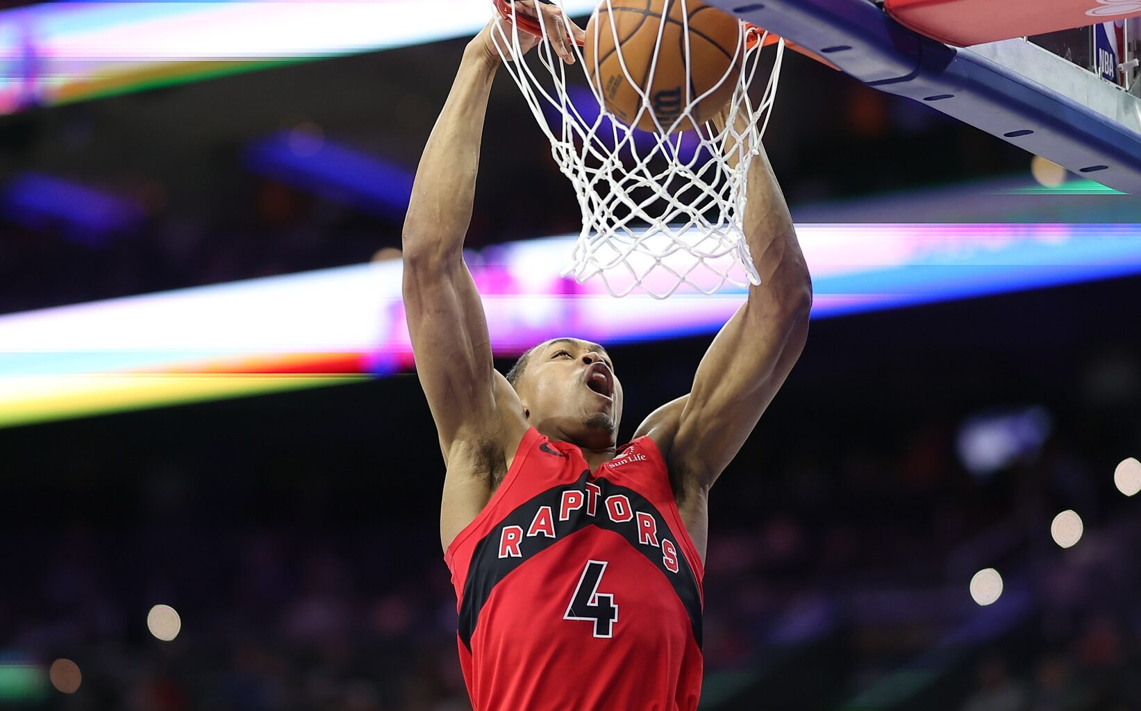 Mar 30, 2025; Philadelphia, Pennsylvania, USA; Toronto Raptors forward Scottie Barnes (4) dunks the ball against the Philadelphia 76ers during the third quarter at Wells Fargo Center. Mandatory Credit: Bill Streicher-Imagn Images