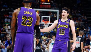 Mar 29, 2025; Memphis, Tennessee, USA; Los Angeles Lakers guard Austin Reaves (15) reacts with forward LeBron James (23) during the second quarter against the Memphis Grizzlies at FedExForum. Mandatory Credit: Petre Thomas-Imagn Images