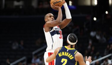 Mar 27, 2025; Washington, District of Columbia, USA; Washington Wizards forward Khris Middleton (32) takes a shot over Indiana Pacers guard Andrew Nembhard (2) during the first half at Capital One Arena. Mandatory Credit: Daniel Kucin Jr.-Imagn Images