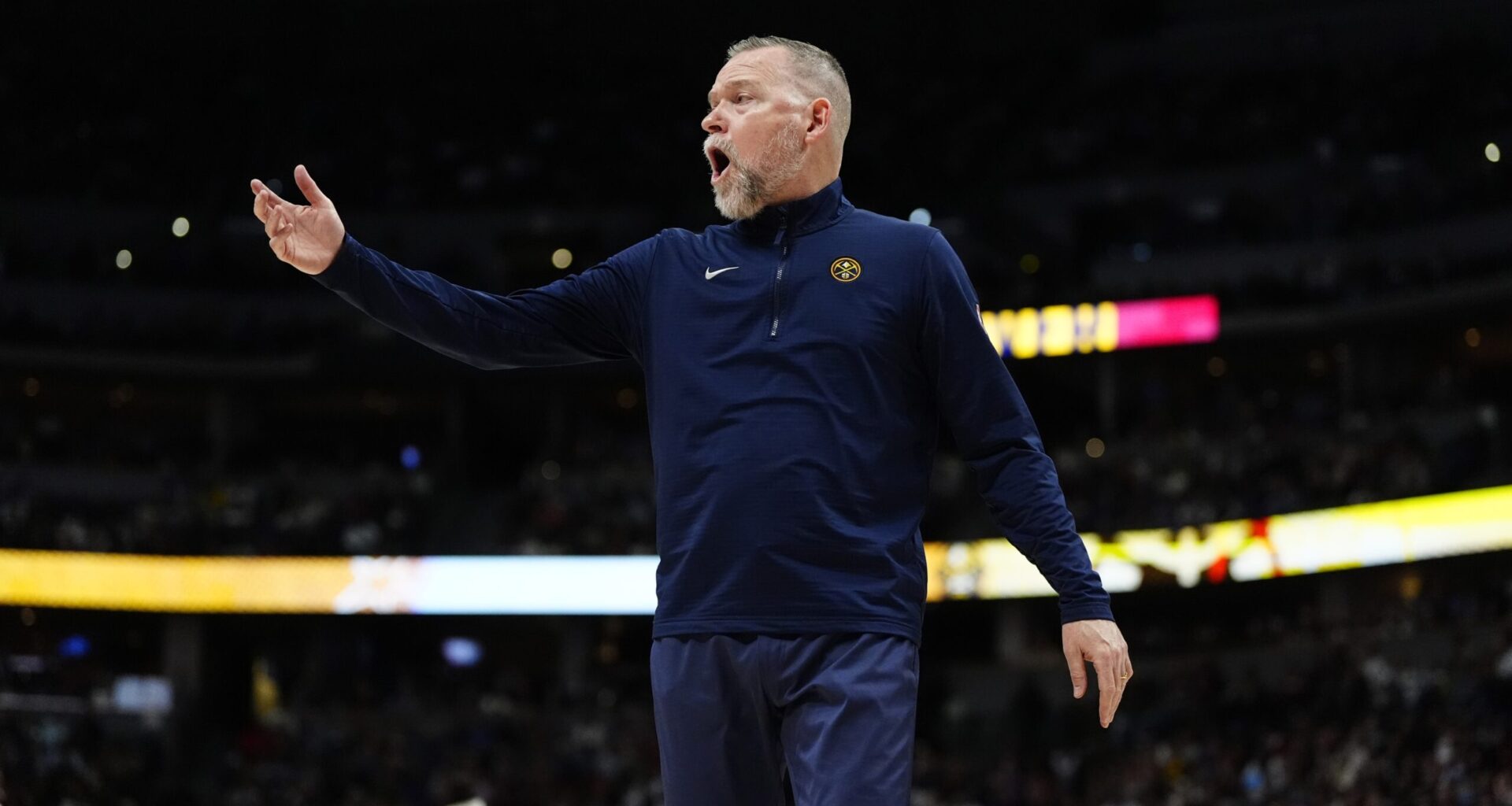 Apr 6, 2025; Denver, Colorado, USA; Denver Nuggets head coach Michael Malone reacts in the second half against the Indiana Pacers at Ball Arena.