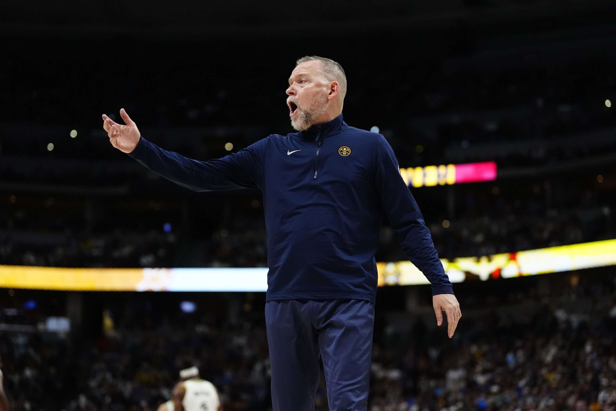 Apr 6, 2025; Denver, Colorado, USA; Denver Nuggets head coach Michael Malone reacts in the second half against the Indiana Pacers at Ball Arena.