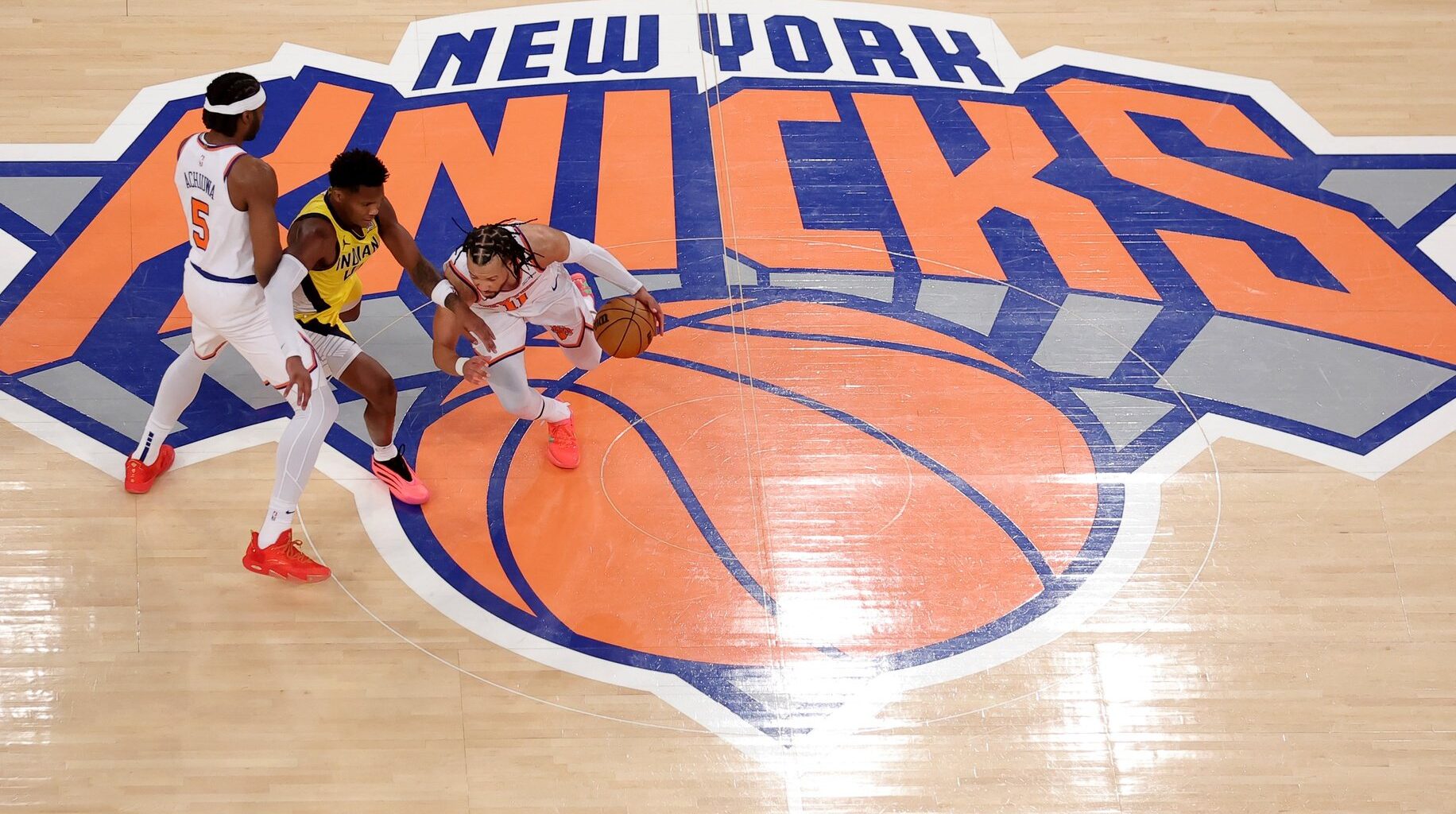 New York Knicks forward Precious Achiuwa (5) sets a pick against Indiana Pacers guard Bennedict Mathurin (00) for Knicks guard Jalen Brunson (