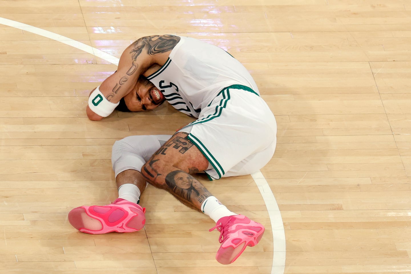 Globe photographer Danielle Parhizkaran had moved to a higher spot in Madison Square Garden during Game 4 of the Eastern Conference semifinals against the Knicks to get a better view of the court when Celtics forward Jayson Tatum crumpled to the floor.
