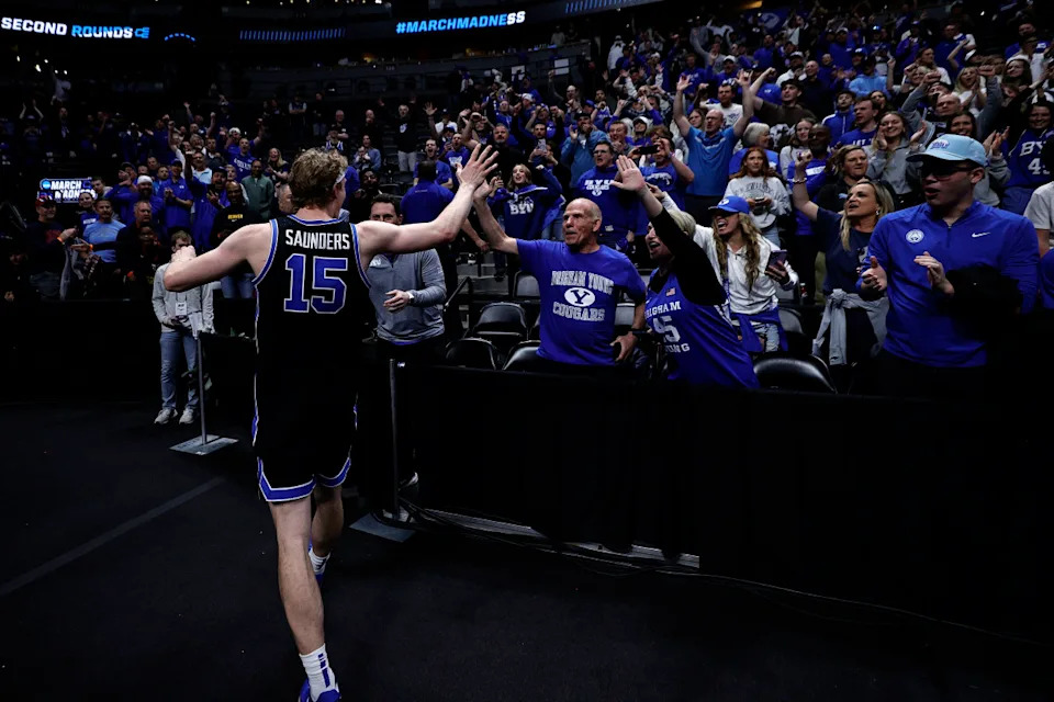 Mar 22, 2025; Denver, CO, USA; Brigham Young Cougars forward Richie Saunders (15) reacts after defeating the Wisconsin Badgers in the second round of the NCAA Tournament at Ball Arena. Mandatory Credit: Isaiah J. Downing-Imagn Images Isaiah J&period; Downing-Imagn Images