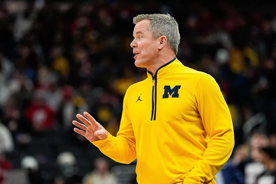 Michigan head coach Dusty May talks to players before a play against Wisconsin during the second half of Big Ten Tournament championship game at Gainbridge Fieldhouse in Indianapolis, Ind. on Sunday, March 16, 2025.