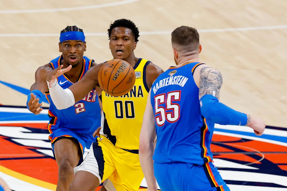 Oklahoma City Thunder guard Shai Gilgeous-Alexander (2) and center Isaiah Hartenstein (55) and Indiana Pacers guard Bennedict Mathurin (00) battle for the loose ball during the third quarter of game two of the 2025 NBA Finals at Paycom Center. Mandatory Credit&colon; Alonzo Adams-Imagn Images