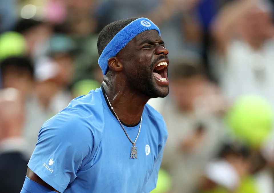 Tiafoe celebrates his fourth-round victory. (Adam Pretty/Getty Images)