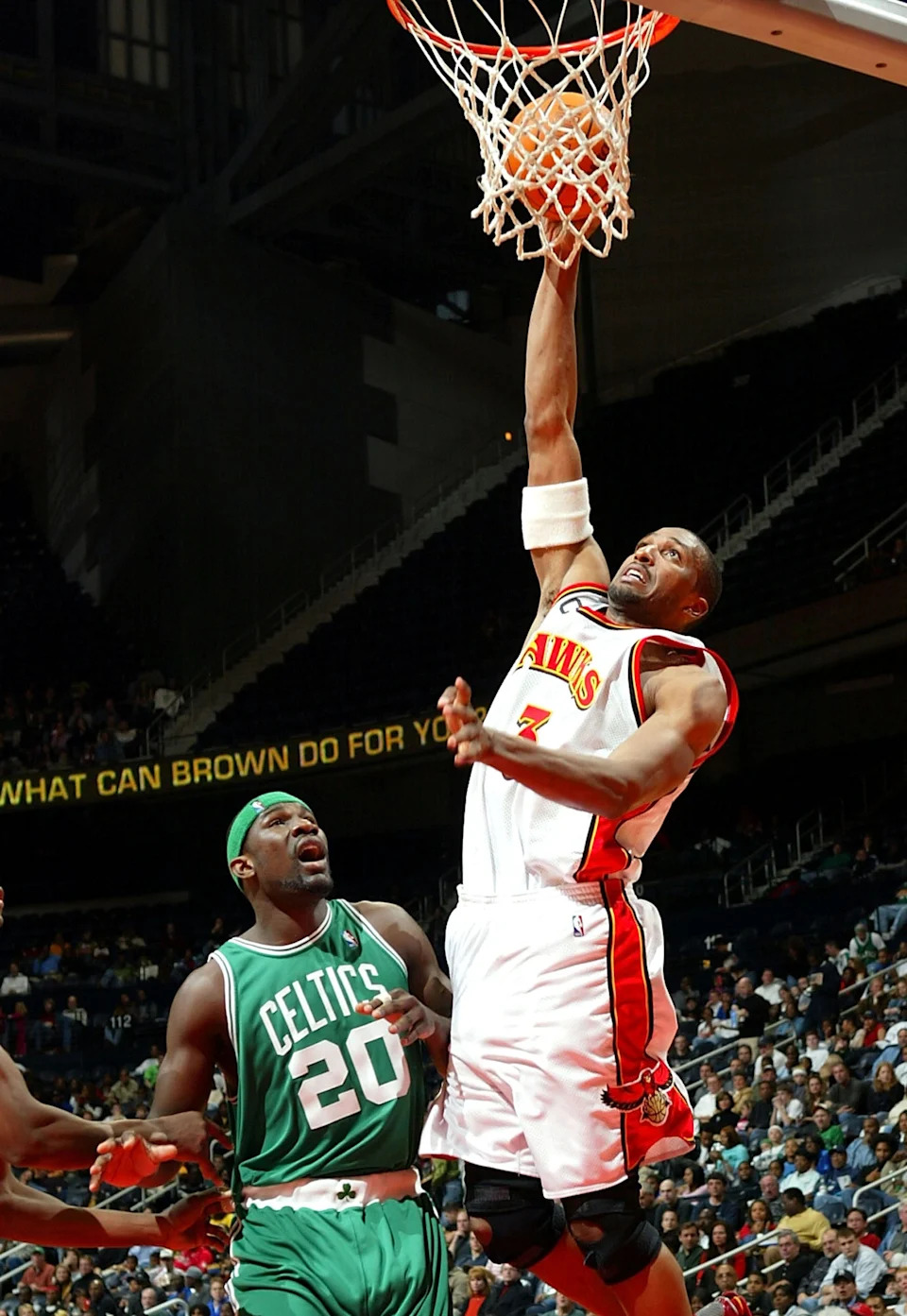 ATLANTA - DECEMBER 23: Shareef Abdur-Rahim #3 of the Atlanta Hawks shoots over Jumaine Jones #20 of the Boston Celtics on December 23, 2003 at Philips Arena in Atlanta, Georgia. NOTE TO USER: User expressly acknowledges and agrees that, by downloading and or using this photograph, User is consenting to the terms and conditions of the Getty Images License Agreement. (Photo by Jamie Squire/Getty Images)