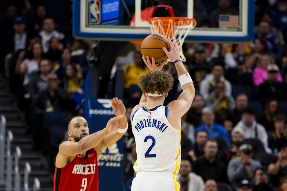Dec 5, 2024; San Francisco, California, USA; Golden State Warriors guard Brandin Podziemski (2) takes a three-point shot against the Houston Rockets during the fourth quarter at Chase Center. Mandatory Credit: John Hefti-Imagn Images