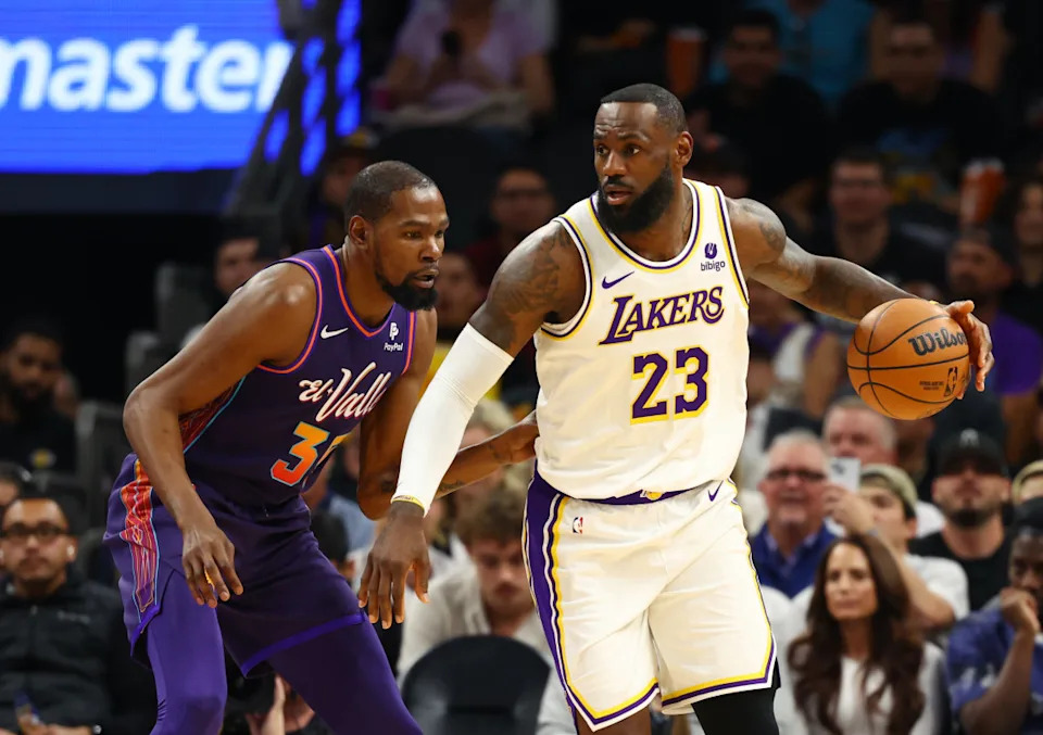 Los Angeles Lakers forward LeBron James (23) and Phoenix Suns forward Kevin Durant (35).© Mark J. Rebilas-USA TODAY Sports