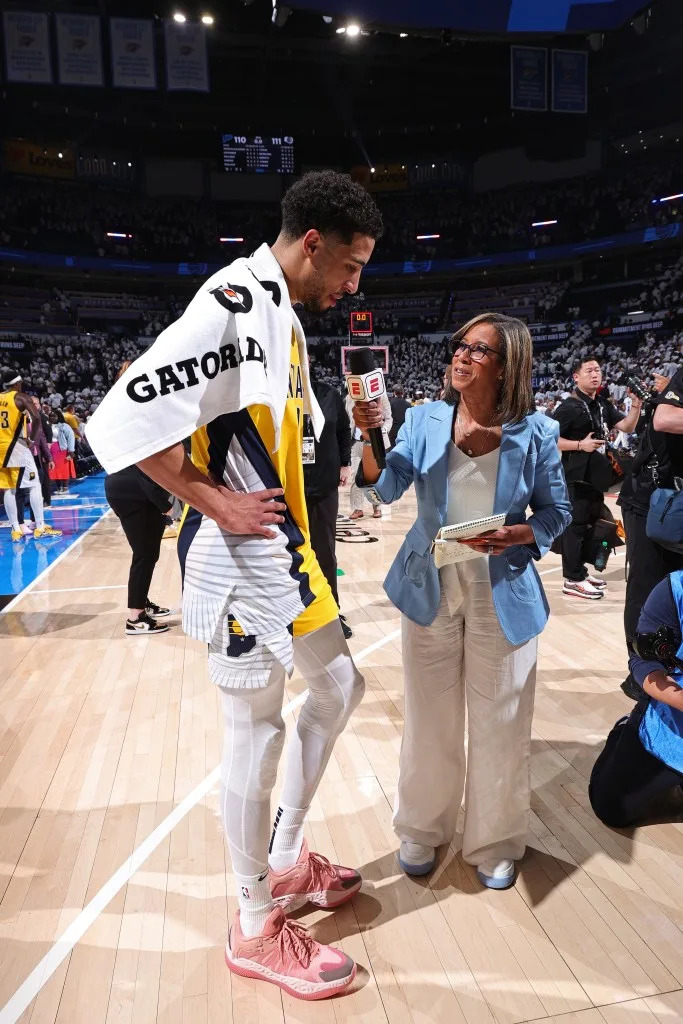 Lisa Salters (r.) interviews Pacers guard Tyrese Haliburton (l.) after Game 1 of the NBA Finals on June 5, 2025. NBAE via Getty Images