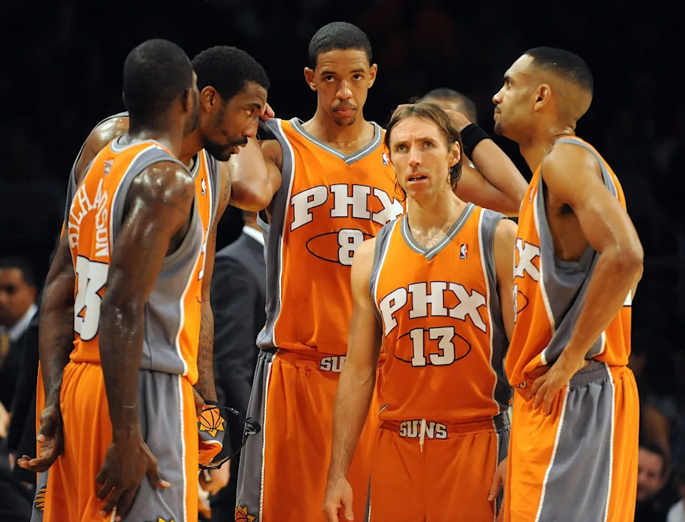 Steve Nash #13, Channing Frye #8, Amar'e Stoudemire #1, Grant Hill #33 and Jason Richardson #23 of the Phoenix Suns talk during a timeout against the Los Angeles Lakers during the first half at Staples Center on Nov. 12, 2009, in Los Angeles, California.