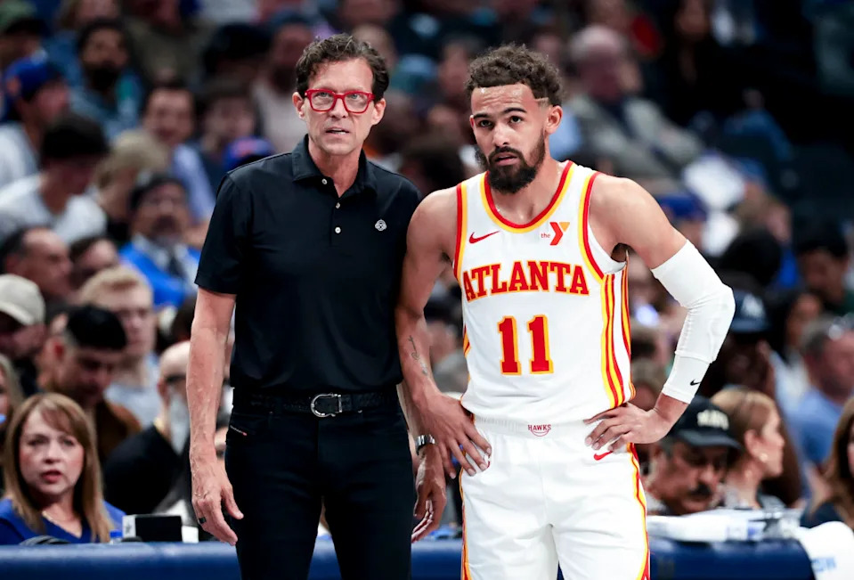 Atlanta Hawks head coach Quin Snyder speaks with guard Trae Young (#11)Kevin Jairaj-Imagn Images