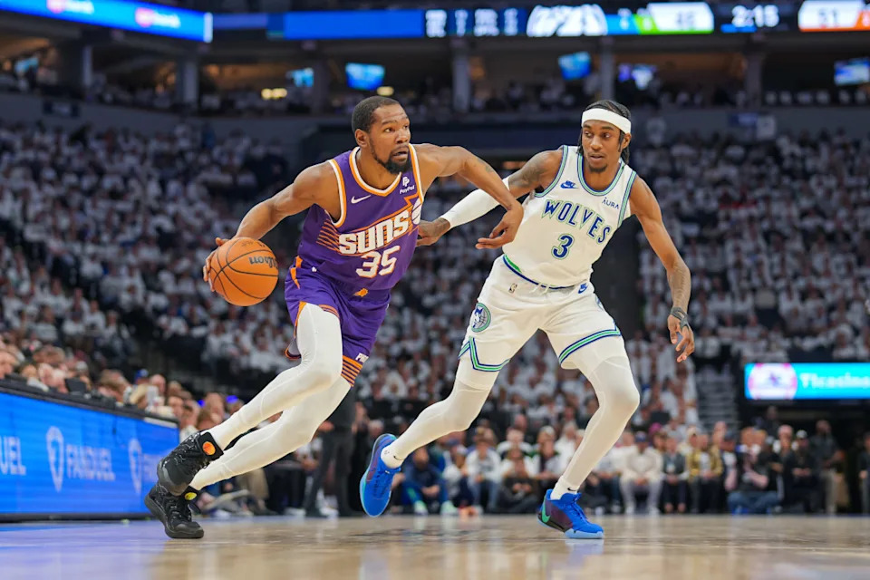 Former Phoenix Suns forward Kevin Durant (35) and Minnesota Timberwolves forward Jaden McDaniels (3).Credit&colon; Brad Rempel-Imagn Images