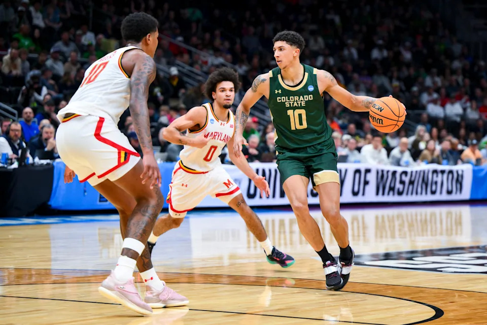 Mar 23, 2025; Seattle, WA, USA; Colorado State Rams guard Nique Clifford (10) dribbles the ball against Maryland Terrapins guard Ja'Kobi Gillespie (0) and forward Julian Reese (10) in the second half at Climate Pledge Arena. Mandatory Credit: Steven Bisig-Imagn Images