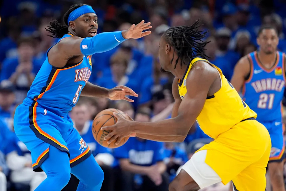 Thunder guard Luguentz Dort (5) defends Pacers forward Aaron Nesmith (23) during Game 2 of the NBA Finals at Paycom Center on June 8. Oklahoma City won 123-107.