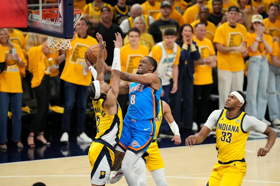 Jun 13, 2025; Indianapolis, Indiana, USA; Oklahoma City Thunder forward Jalen Williams (8) drives to the basket against Indiana Pacers guard Andrew Nembhard (2) during the first half during game four of the 2025 NBA Finals at Gainbridge Fieldhouse. Mandatory Credit: Kyle Terada-Imagn Images