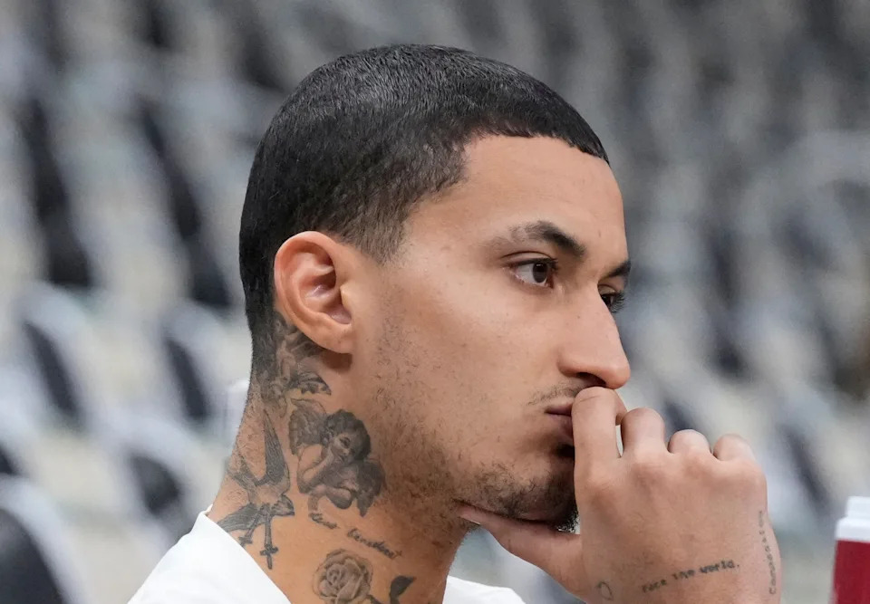 Apr 25, 2025; Milwaukee, Wisconsin, USA; Milwaukee Bucks forward Kyle Kuzma (18) sits on the bench as other players warm before game three of first round against the Indiana Pacers for the 2024 NBA Playoffs at Fiserv Forum. Mandatory Credit: Michael McLoone-Imagn Images