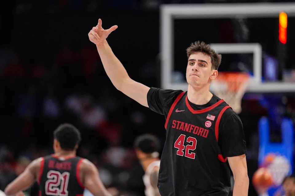 Mar 13, 2025; Charlotte, NC, USA; Stanford Cardinal forward Maxime Raynaud (42) after a dunk against the Louisville Cardinals during the second half at Spectrum Center.© Jim Dedmon-Imagn Images
