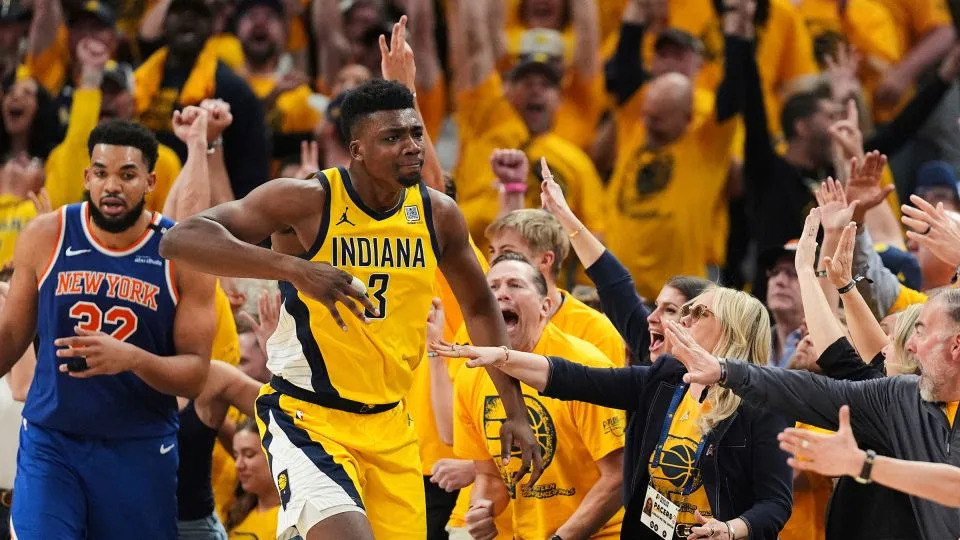 Indiana Pacers center Thomas Bryant celebrates after making a 3-pointer during the second half of Game 6 of the Eastern Conference finals. - Michael Conroy/AP