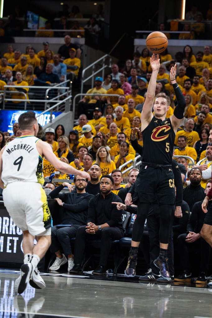 Cleveland Cavaliers guard Sam Merrill (5) shoots the ball while Indiana Pacers guard T.J. McConnell (9) defends during game three of the second round for the 2025 NBA Playoffs at Gainbridge Fieldhouse. 