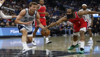 Los Angeles Clippers guard James Harden, right, strips Orlando Magic forward Franz Wagner, left, of ball during the first half of an NBA basketball game, Monday, March 31, 2025, in Orlando, Fla. (AP Photo/Kevin Kolczynski)