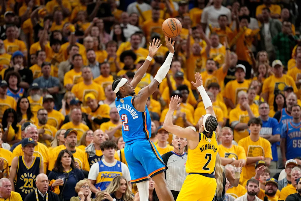 Thunder guard Shai Gilgeous-Alexander shoots the ball over Pacers guard Andrew Nembhard during the second half.