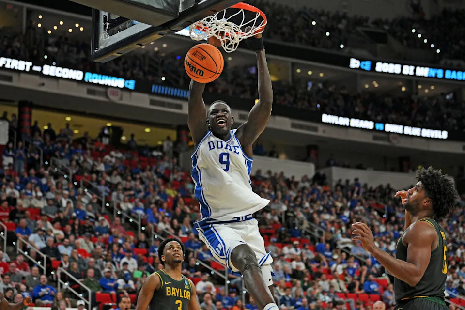 Mar 23, 2025; Raleigh, NC, USA; Duke Blue Devils center Khaman Maluach (9) dunks the ball during the second half against the Baylor Bears in the second round of the NCAA Tournament at Lenovo Center. Mandatory Credit: Zachary Taft-Imagn Images