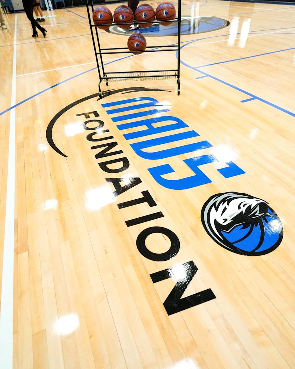 The Dallas Mavericks and Mavs Foundation unveil a new basketball court at the Fort Worth Juvenile Detention Center on Thursday, June 12, 2025 in Fort Worth. The renovations include a newly surfaced wooden court, new backboards, hoops and new paint for the entire gym. (Photo by Vernon Bryant/Dallas Mavericks)