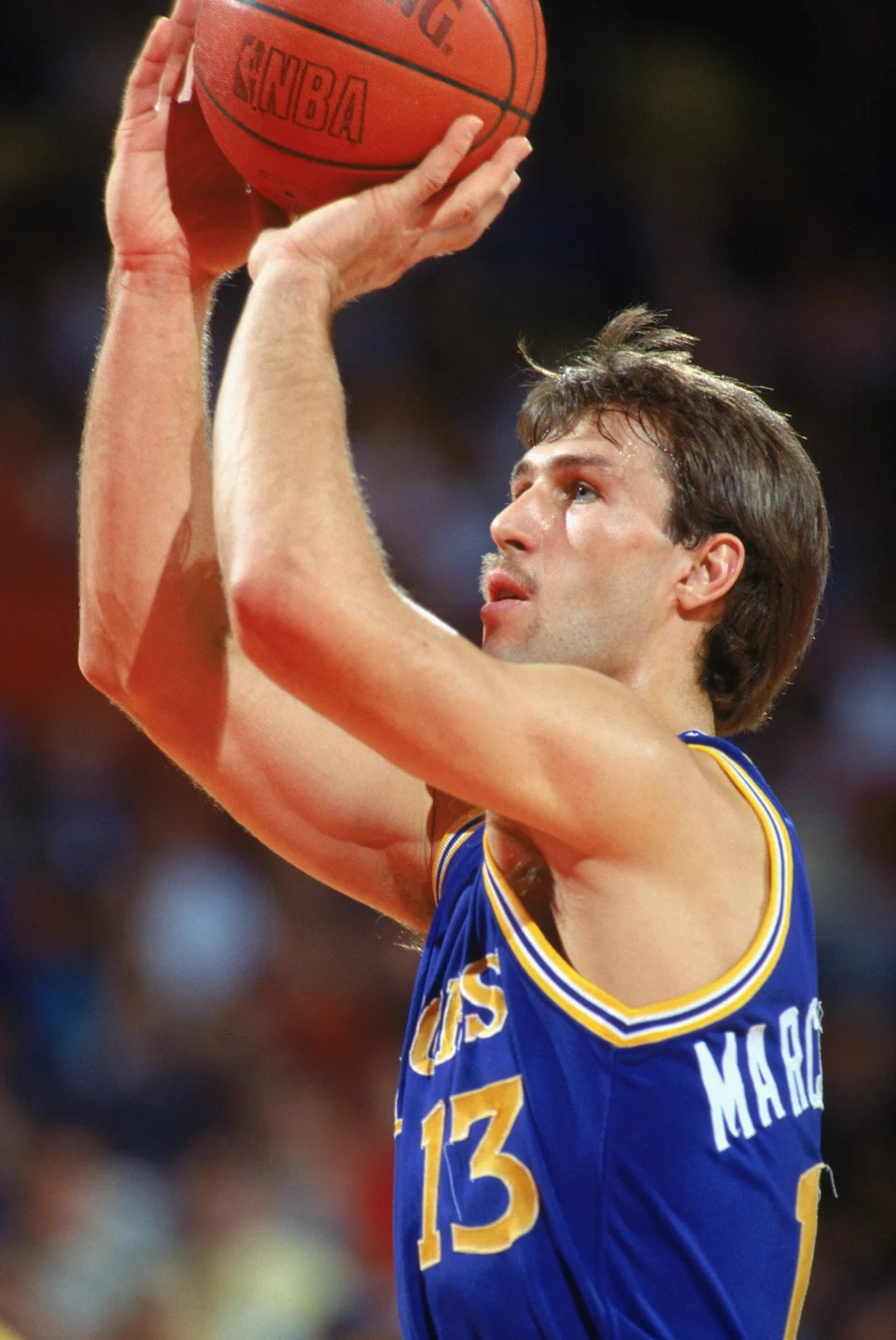 1989: Sarunas Marciulionis #13 of the Golden State Warriors shoots during an NBA game in the 1989-90 season. NOTE TO USER: User expressly acknowledges and agrees that, by downloading and/or using this Photograph, User is consenting to the terms and conditions of the Getty Images License Agreement. (Photo by: Tim DeFrisco/Getty Images