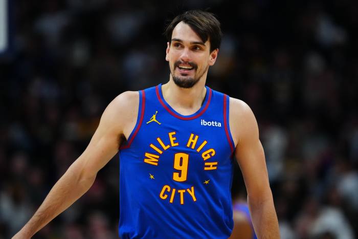 Jan 8, 2025; Denver, Colorado, USA; Denver Nuggets forward Dario Saric (9) reacts in the second half against the LA Clippers at Ball Arena. Mandatory Credit: Ron Chenoy-Imagn Images  