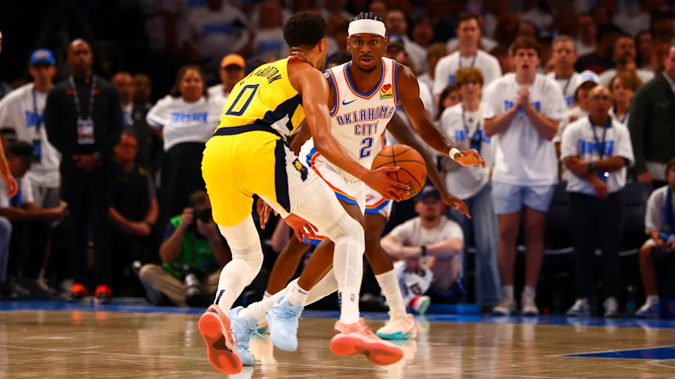 OKLAHOMA CITY, OK - JUNE 5: Tyrese Haliburton #0 of the Indiana Pacers handles the ball while Shai Gilgeous-Alexander #2 of the Oklahoma City Thunder plays defense during the game during Game One of the 2025 NBA Finals on June 5, 2025 at Paycom Center in Oklahoma City, Oklahoma. NOTE TO USER: User expressly acknowledges and agrees that, by downloading and or using this photograph, User is consenting to the terms and conditions of the Getty Images License Agreement. Mandatory Copyright Notice: Copyright 2025 NBAE (Photo by Zach Beeker/NBAE via Getty Images)