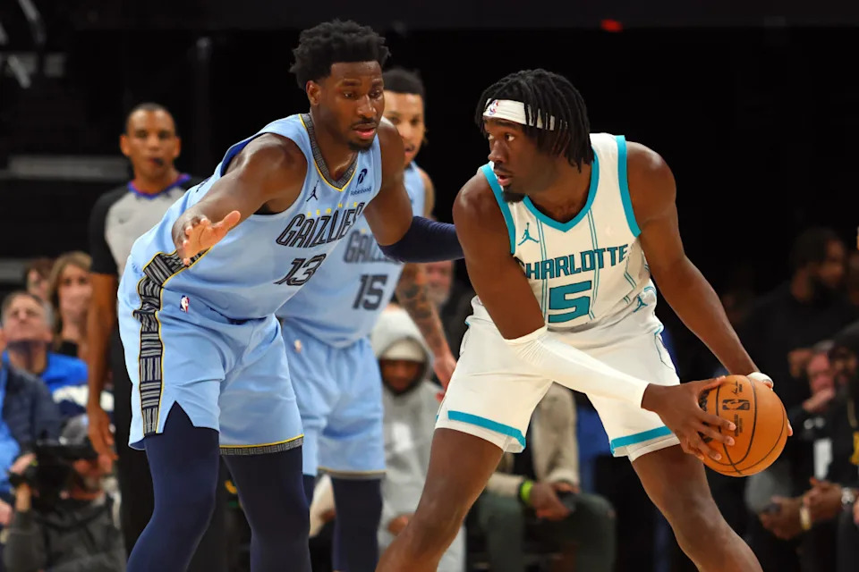 Memphis Grizzlies center Jaren Jackson Jr. and Charlotte Hornets center Mark Williams.Petre Thomas-Imagn Images