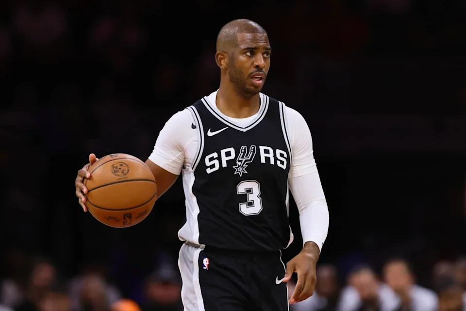 Oct 15, 2024; Miami, Florida, USA; San Antonio Spurs guard Chris Paul (3) dribbles the basketball against the Miami Heat during the first quarter at Kaseya Center. Mandatory Credit: Sam Navarro-Imagn ImagesMandatory Credit: Sam Navarro-Imagn Images