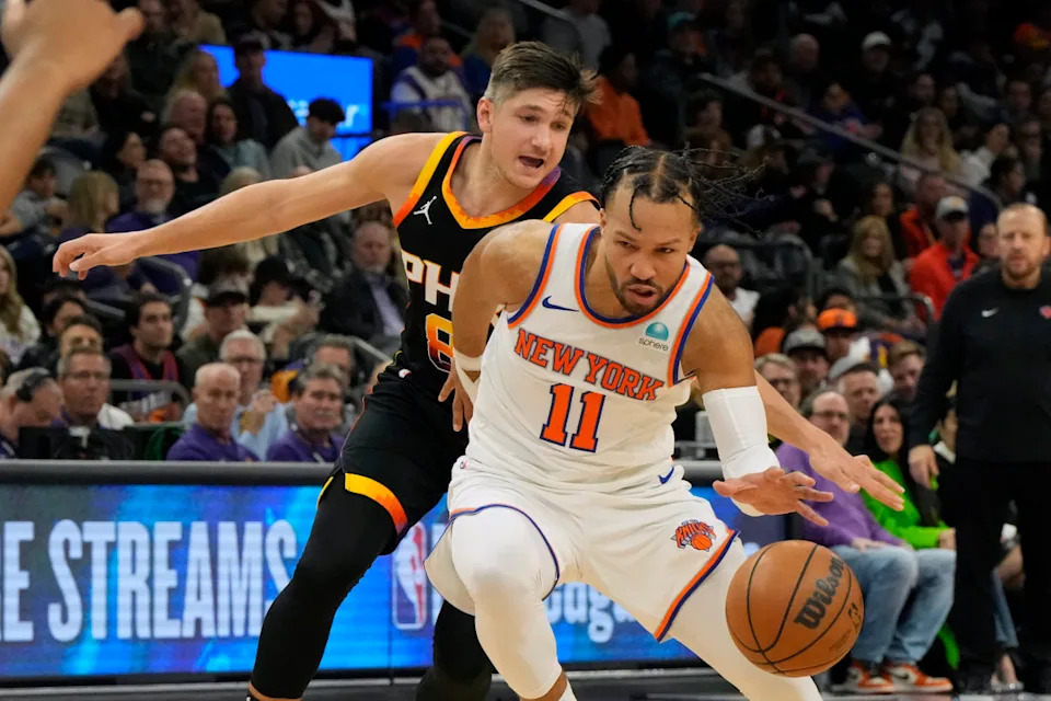 Dec 15, 2023; Phoenix, Arizona, USA; New York Knicks guard Jalen Brunson (11) drives on Phoenix Suns guard Grayson Allen (8) in the second half at Footprint Center. Mandatory Credit: Rick Scuteri-Imagn Images© Rick Scuteri-Imagn Images