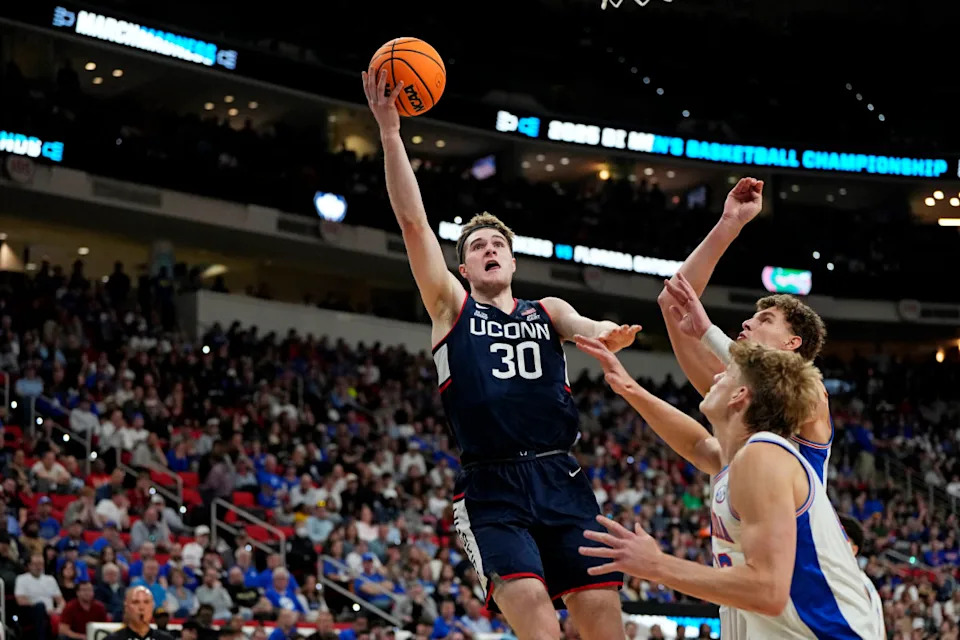 University of Connecticut forward Liam McNeeley drives to the basket.Bob Donnan-Imagn Images