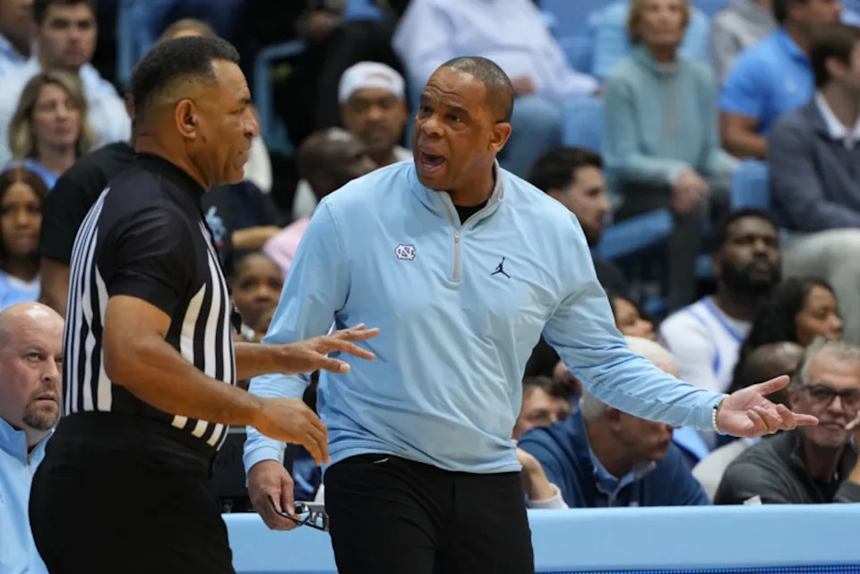 UNC head coach Hubert Davis in discussion with a referee.© Bob Donnan-USA TODAY Sports