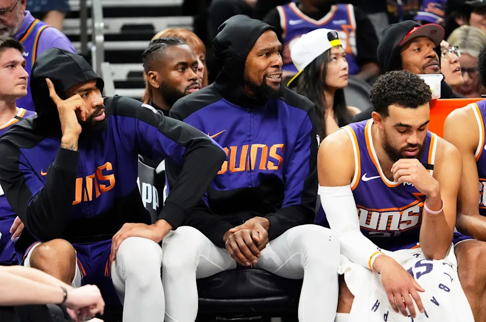 Phoenix Suns forward Kevin Durant (35) watches the action from the bench against the Boston Celtics in the fourth quarter at PHX Arena in Phoenix on March 26, 2025.