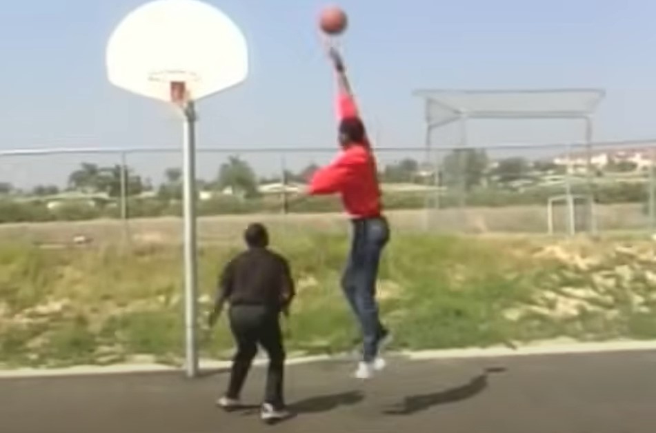 An older Gervin still had the moves as he scored over Jordan