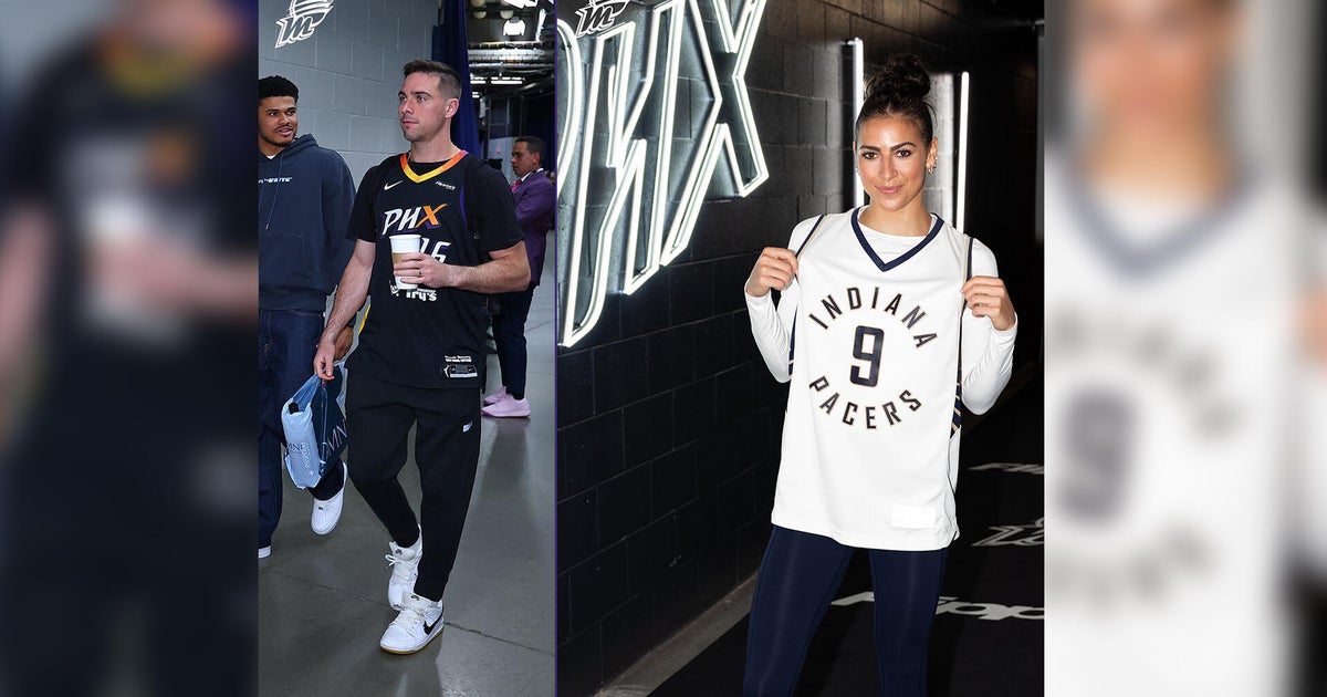 T.J. and Megan McConnell swap jerseys before Game 1 of NBA Finals