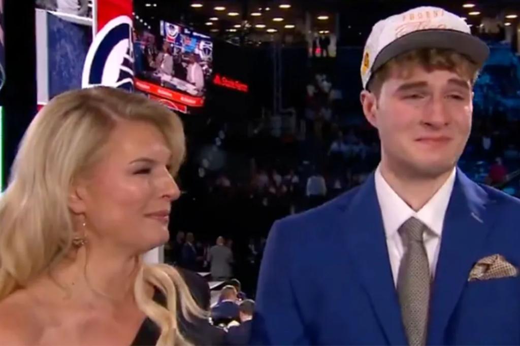 Liam McNeeley in tears with mom in emotional 2025 NBA Draft moment