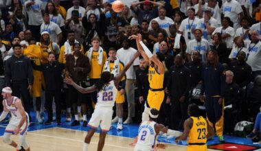 Pacers guard Tyrese Haliburton (0) shoots the game winning basket over Oklahoma City Thunder guard Cason Wallace (22) in the closing second of the second half of Game 1 of the NBA Finals basketball series Thursday, June 5, 2025, in Oklahoma City. (AP Photo/Nate Billings)